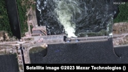 На супутниковому знімку – гребля Каховської ГЕС, контрольована Росією, до підриву, 5 червня 2023 року