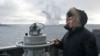Володимир Путін спостерігає за спільними навчаннями Північного та Чорноморського флотів з борту крейсера «Маршал Устинов» у Чорному морі біля берегів Криму, 9 січня 2020 року